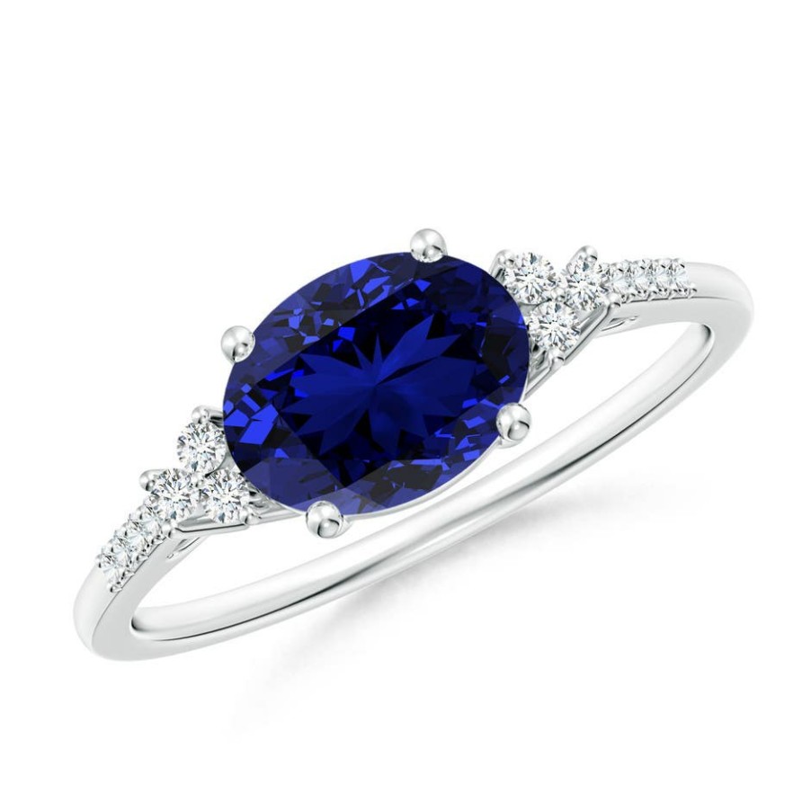 Rings Angara Blue Sapphire | Lab-Grown Horizontally Set Oval Sapphire Solitaire Ring With Trio Lab Diamond Accents